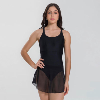 Woman wearing a black swimsuit with sheer panels on a white background