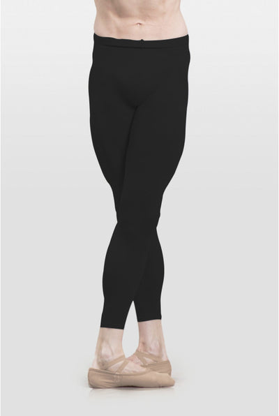 Person wearing black leggings on a white background