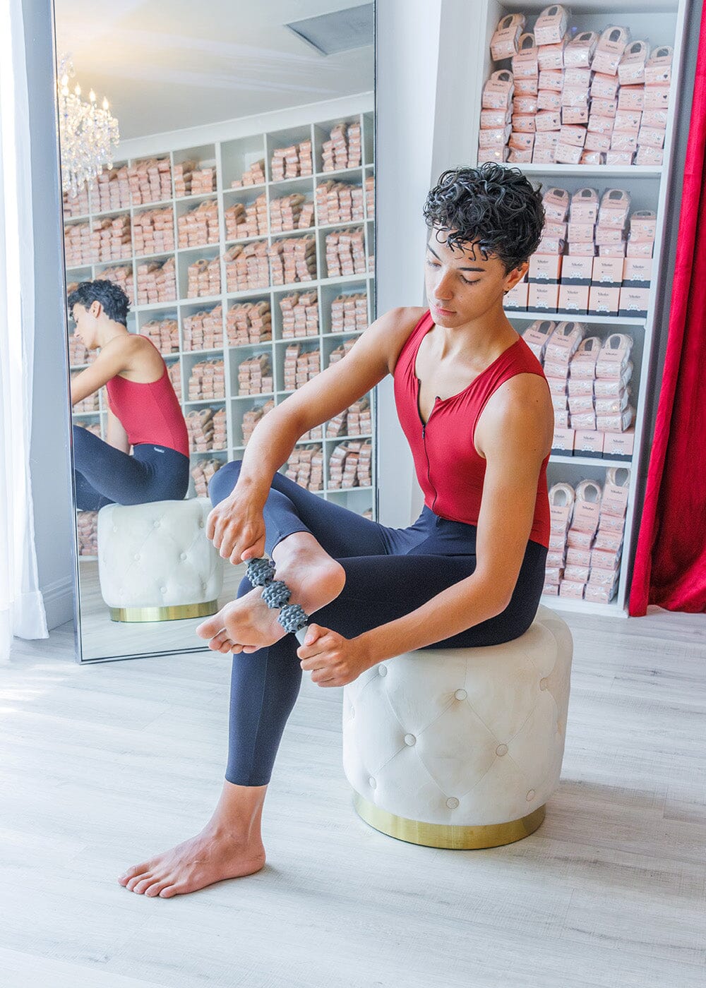 Male dancer with a foot roller