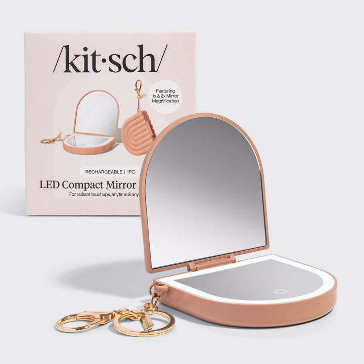 Kit-sch LED compact mirror with packaging on a light gray background