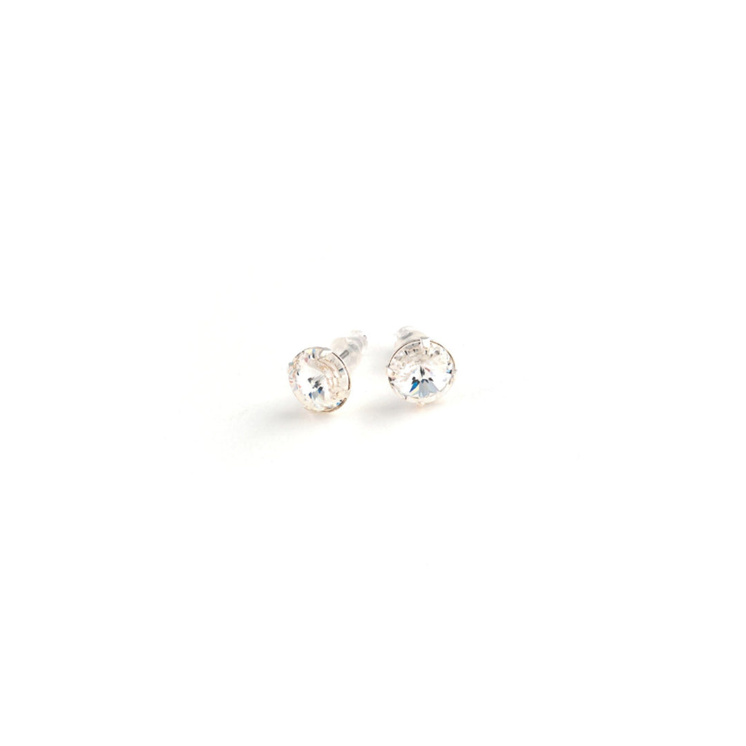 Pair of silver stud earrings with clear gemstones on a white background
