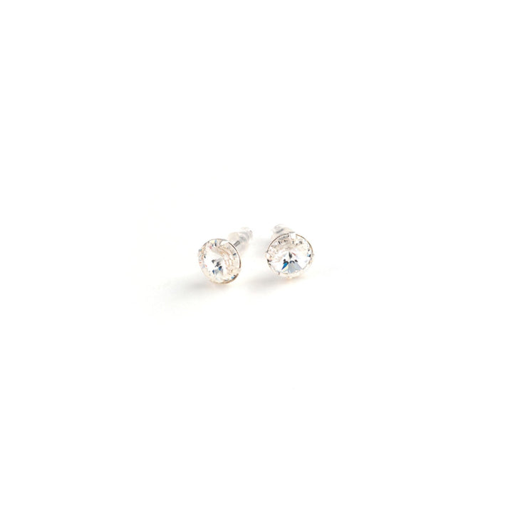 Pair of silver stud earrings with clear gemstones on a white background
