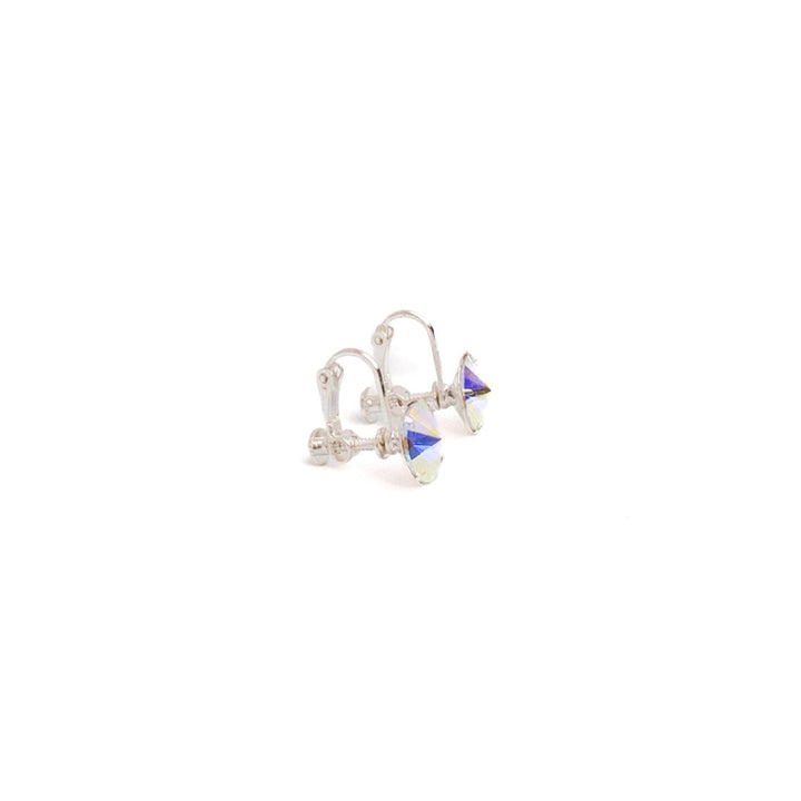 Silver earrings with purple gemstones on a white background