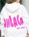 White hoodie with pink 'OH LA LA' text on the back, worn by a person.