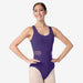 Person wearing a purple leotard on a white background