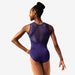 Woman wearing a purple leotard with mesh back design on a white background