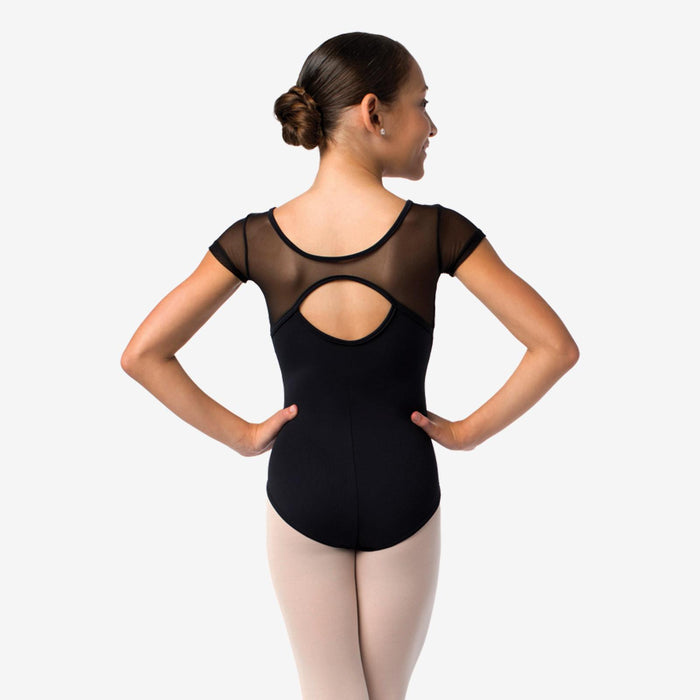 Ballerina wearing a black leotard with sheer mesh details on a white background