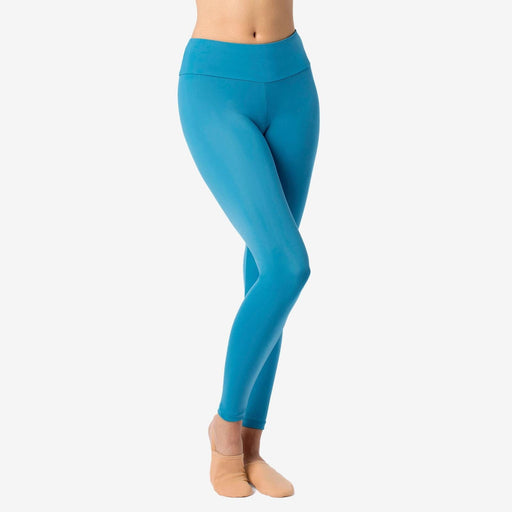 Blue leggings worn by a person on a white background