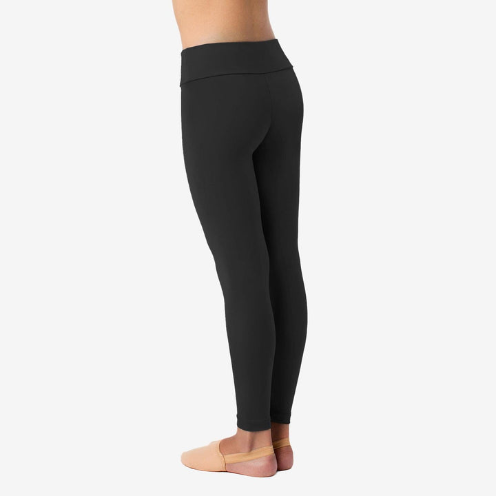 Black leggings worn by a person on a white background