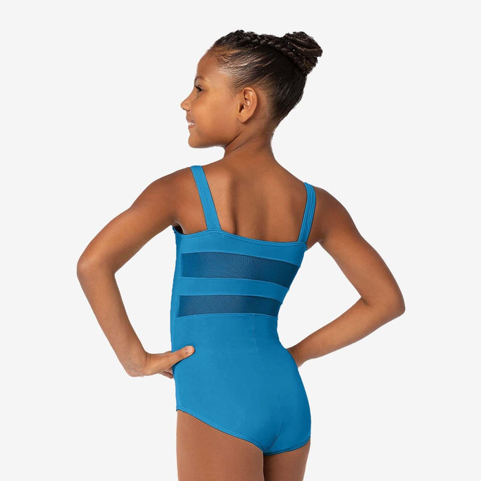 Girl wearing a blue leotard on a white background