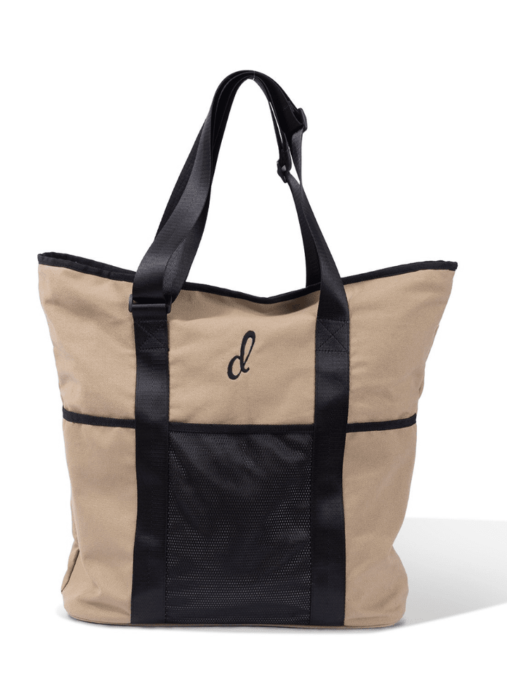 Beige tote bag with black accents on a white background