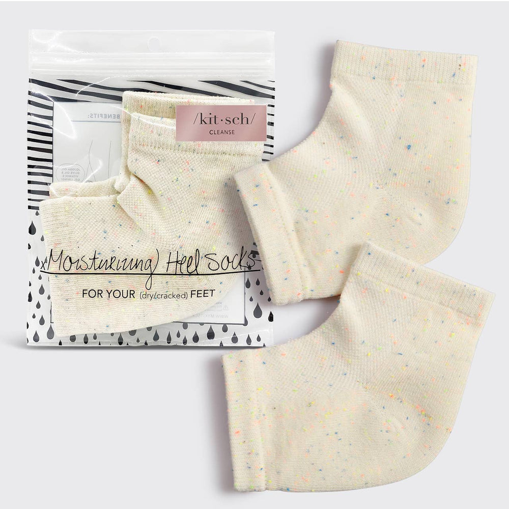 Set of moisturizing heel socks with packaging on a white background