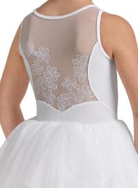 White dress with floral lace detailing on the back against a white background