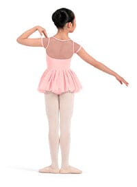 Ballerina in a pink tutu and white tights on a white background