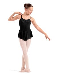 Ballerina in a black leotard and pink tights on a white background