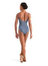 Person wearing a blue swimsuit with a white background