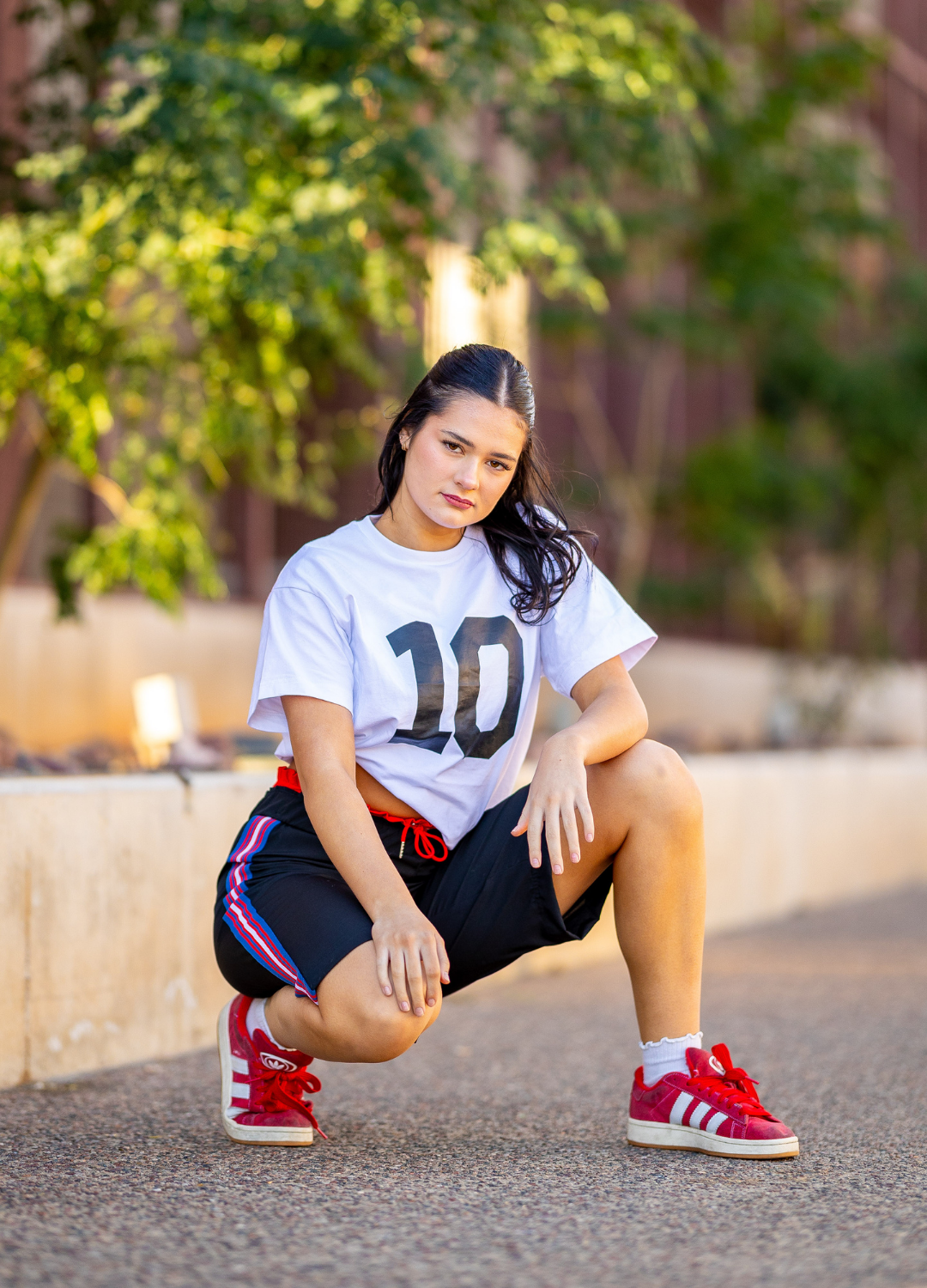 Dance kneeling on street