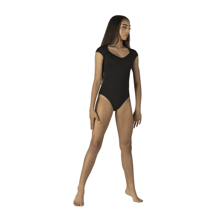 A woman modeling a black short-sleeve leotard against a plain white background.