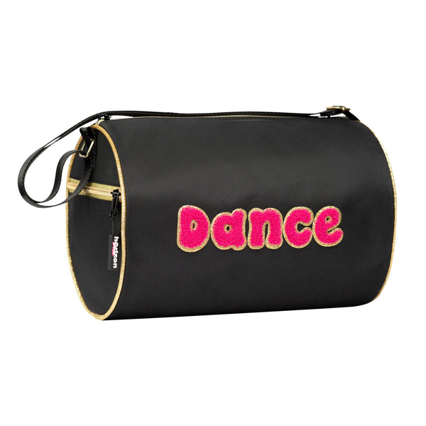 Black dance bag with pink 'dance' text on a white background