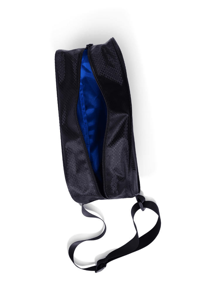 Black travel pouch with blue interior on a white background