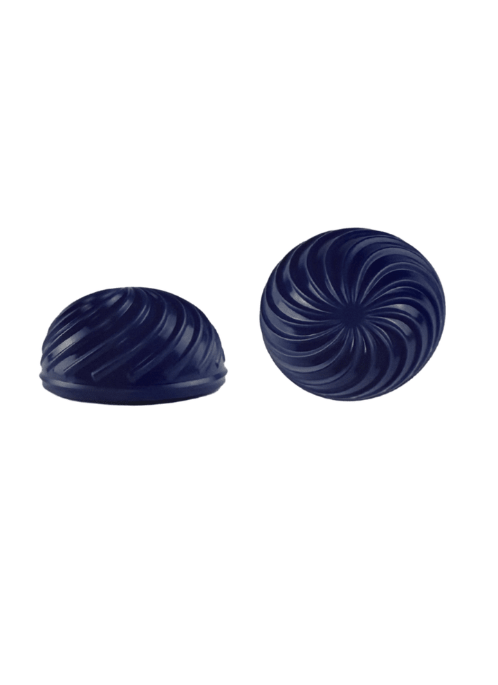 Two blue rubber dog toys with textured surfaces on a white background