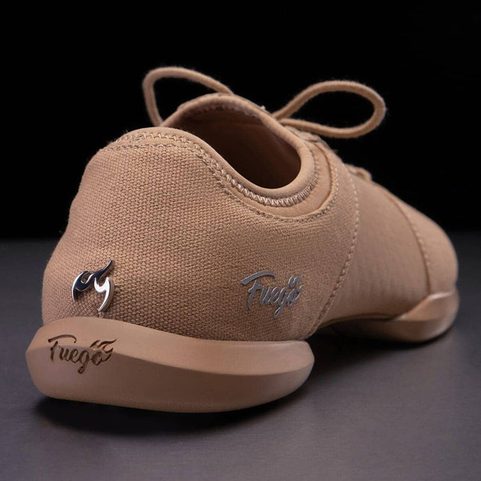 Tan sneaker with 'Fugé' branding on a dark background