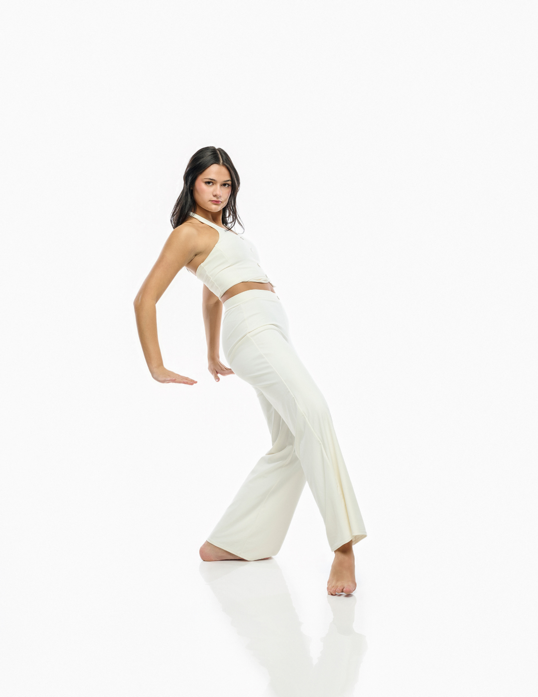 Model wearing dance pants and matching top