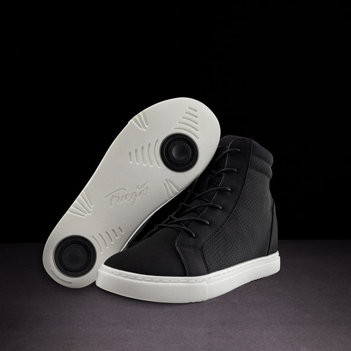 A pair of black high-top wedge sneakers with lace-up closure, displaying the sole with grip patterns.