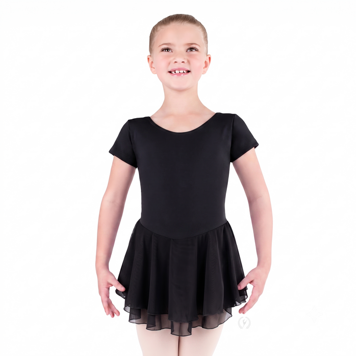 Young girl wearing a black dress on a white background