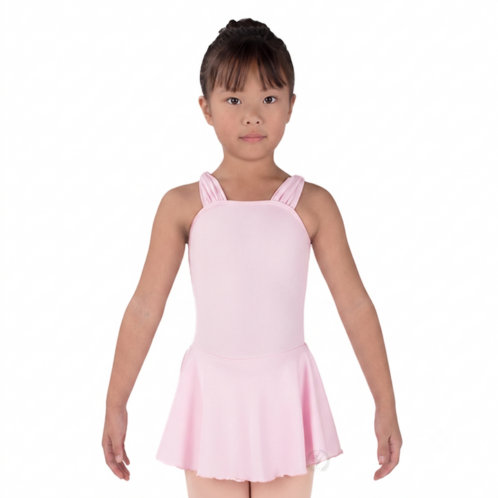 Young girl wearing a pink dress on a white background