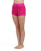 Person wearing bright pink shorts on a white background