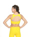 Person wearing a yellow sports bra and leggings on a white background