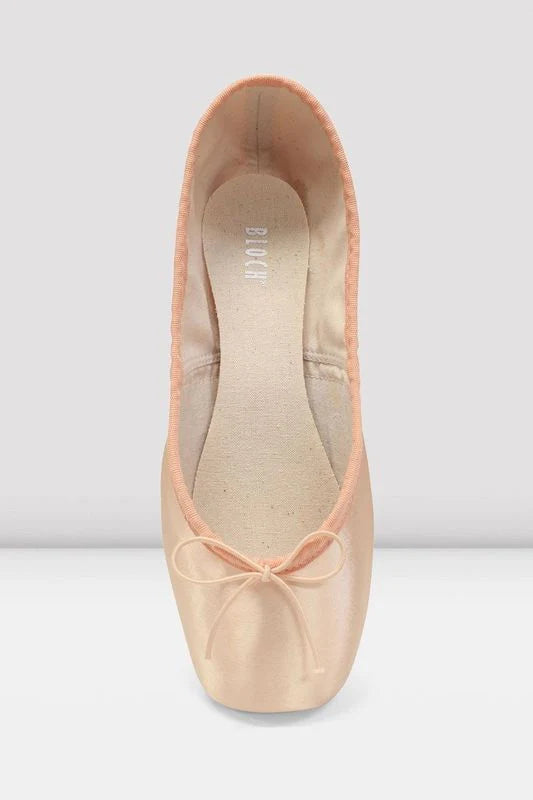 Pink ballet shoe with a bow on a white background