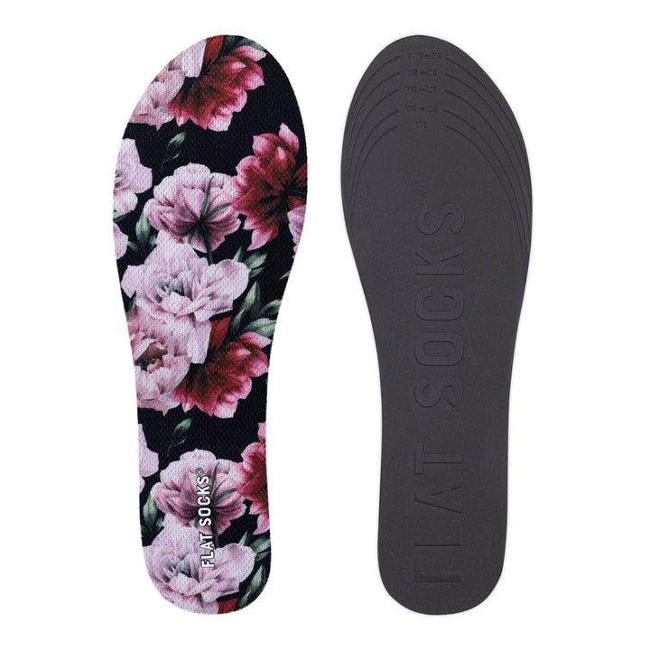 Floral-patterned insole on one side and plain insole on the other, with 'AT Socks' branding.