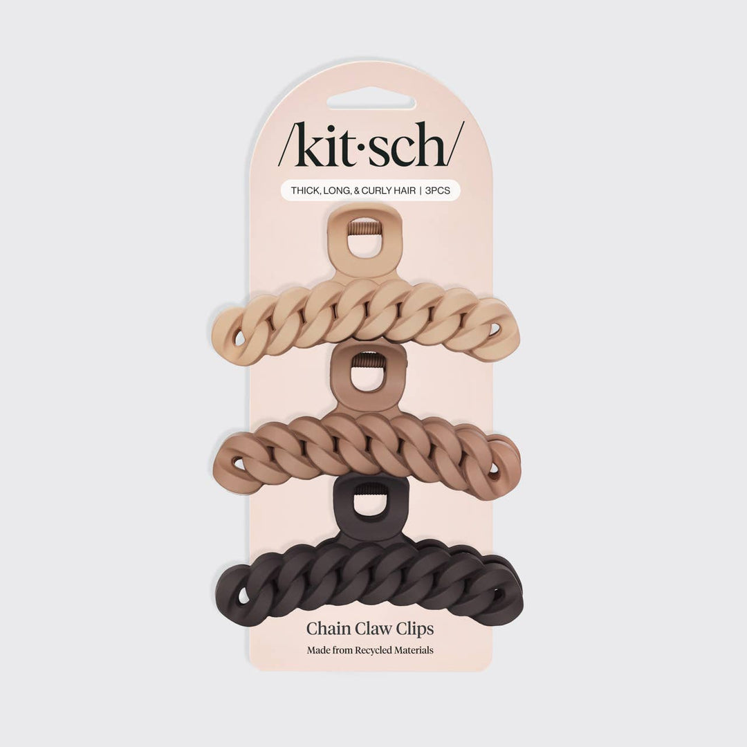 Packaged chain claw clips with 'kitsch' branding on a light gray background