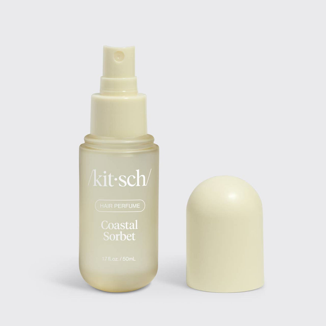 Kitsch Coastal Sorbet hair perfume bottle on a light gray background