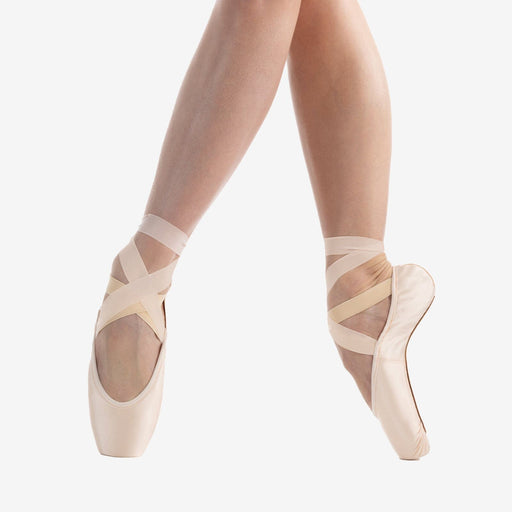 Ballet shoes with mesh design on a white background