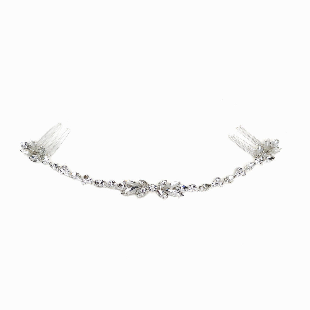 Silver necklace with clear crystals on a white background