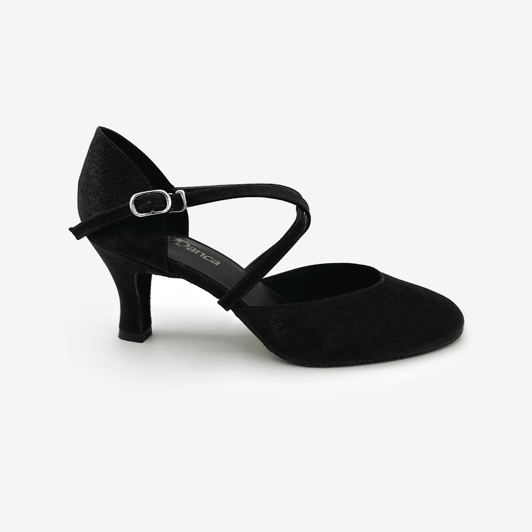 Black dance shoe with a strap on a white background