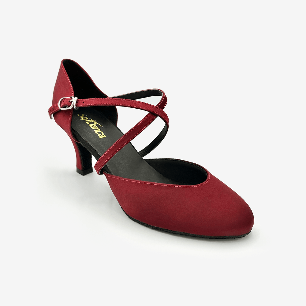 Red dance shoe with a strap on a white background
