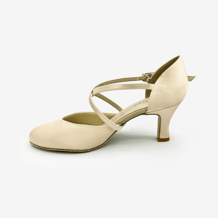 Beige shoe with a strappy design on a white background