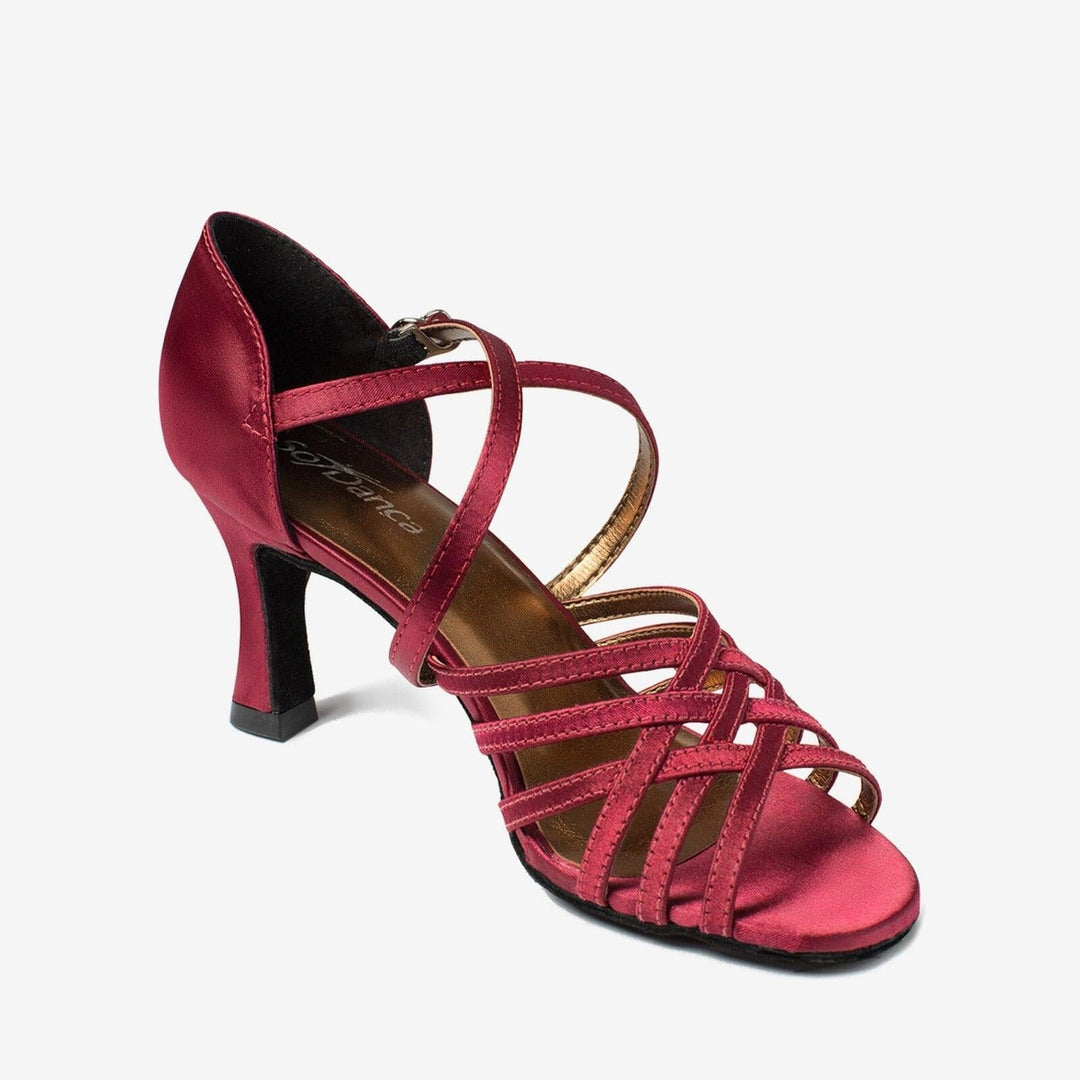 Red dance shoe with a strappy design on a white background