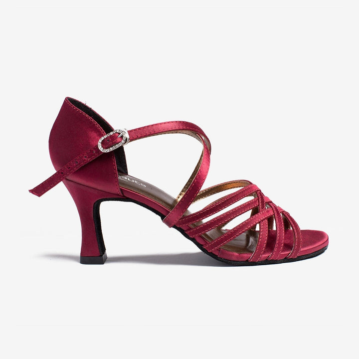 Red satin sandal with a strap on a white background