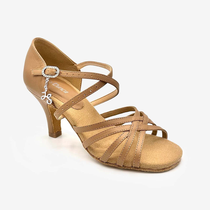 Tan dance shoe with a strappy design on a white background