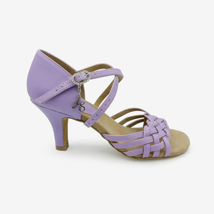 Purple dance shoe with a woven design on a white background