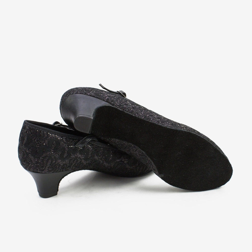 Pair of black shoes on a white background