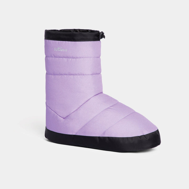 Purple booties with black soles on a white background