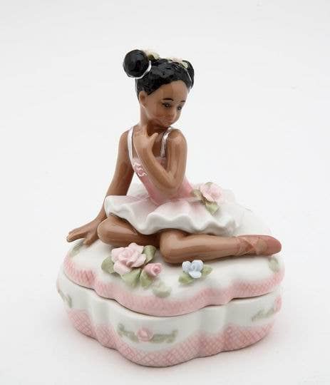 Ballerina sitting on Flower Box