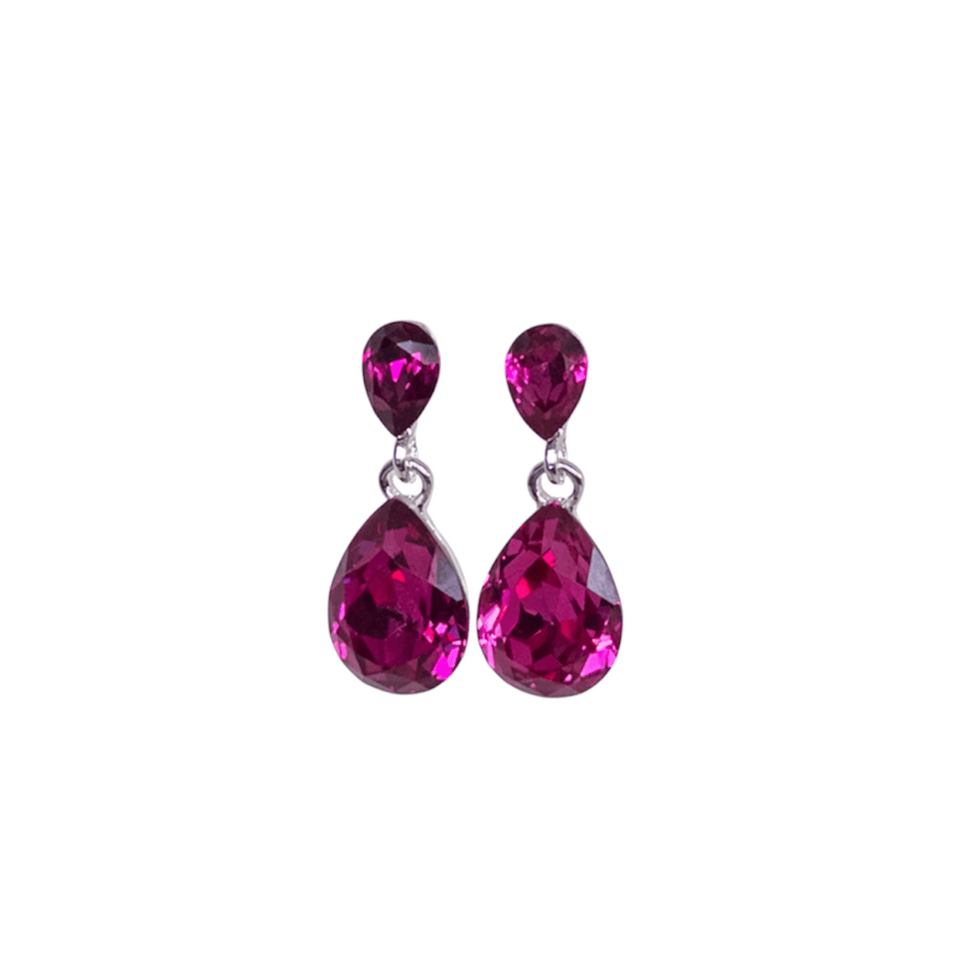 Pair of pink teardrop earrings on a white background