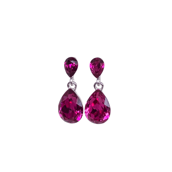 Pair of pink teardrop earrings on a white background